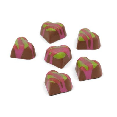 Six pistachio heart selectors sitting out of the box.